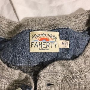 Medium.  3 button Long sleeve shirt